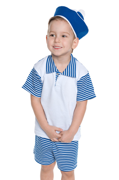 A little boy in a sailor suit - Фото, изображение