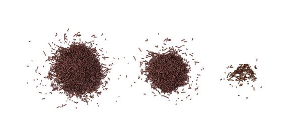 Chocolate sprinkles isolated on white background top view. Sweet brown glaze decoration or chocolate vermicelli - Foto, immagini