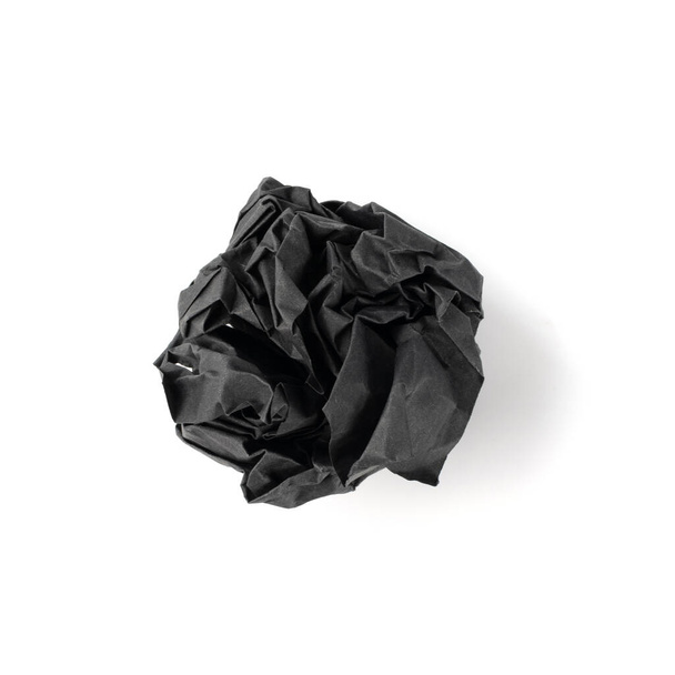Crumpled Black Paper Ball Isolated on White background. Natural Textured Wadded Up Scrunched Sheet. Crumpled Up Dark Paper Ball - Foto, imagen