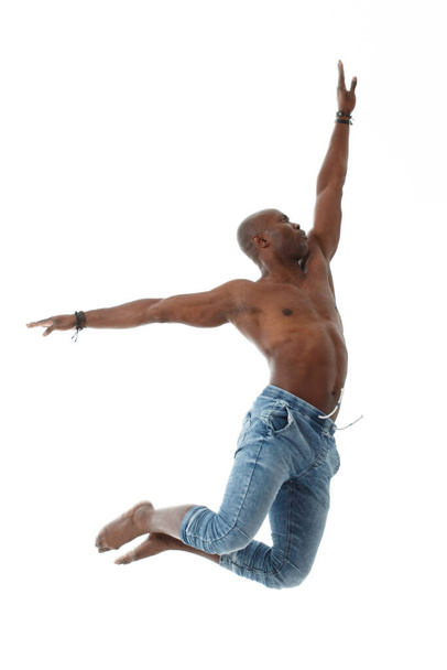 Black man in a jump isolated on white background. - Fotó, kép