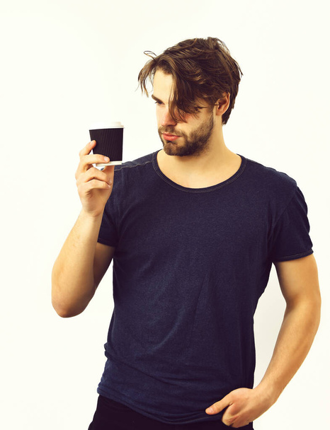 Caucasian sexy young macho holding coffee cup - Zdjęcie, obraz