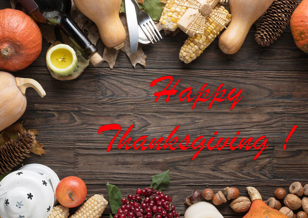slogan Happy Thanksgiving in a frame of autumn vegetables. Festive table - Фото, зображення