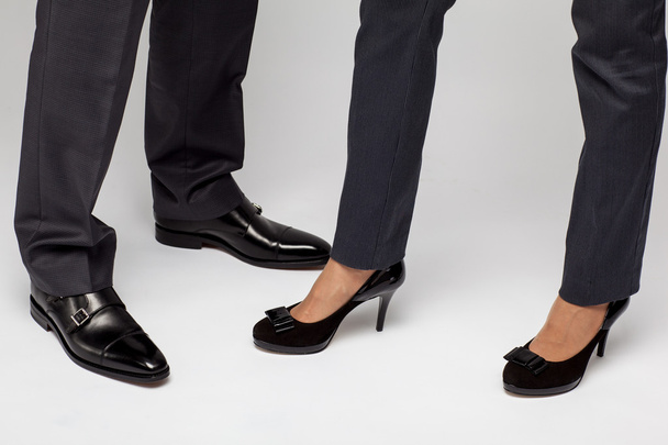 Businessman and businesswoman - closeup of legs - Foto, afbeelding