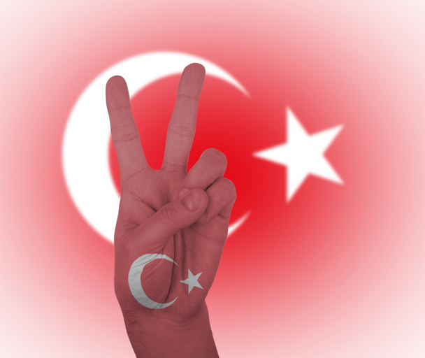 Käsi rauhan merkki Turkin lipun kanssa
 - Valokuva, kuva
