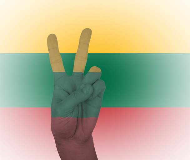 Hand peace sign with flag of Lithuania - Photo, Image