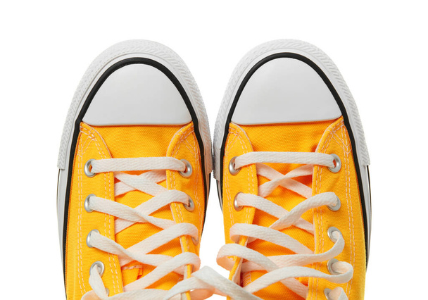 Yellow sneakers isolated on white - Photo, Image