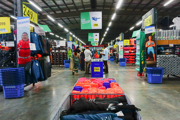 ULUBERIA, HOWRAH, WEST BENGAL / INDIA - 18TH MARCH 2018 : Sports clothes are on display at Dechathlon S.A. - world's largest sporting goods retailer. Editorial stock image. - Photo, Image