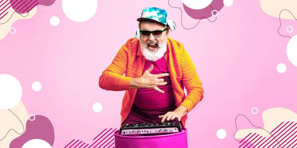 Senior hipster man using devices, gadgets. Tech and joyful elderly lifestyle concept. Bright illustrated background - Foto, Bild