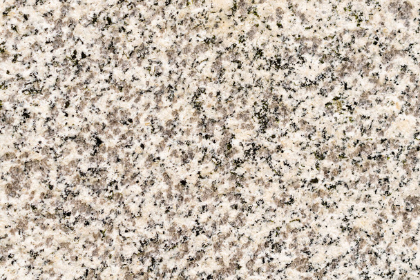 helder graniet met zichtbare details. textuur of achtergrond - Foto, afbeelding