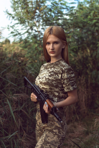 Young blonde in military uniform - Valokuva, kuva
