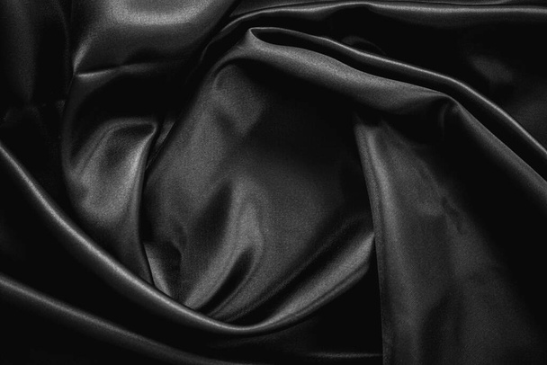fond en tissu de soie brillant noir pour l'espace de copie  - Photo, image