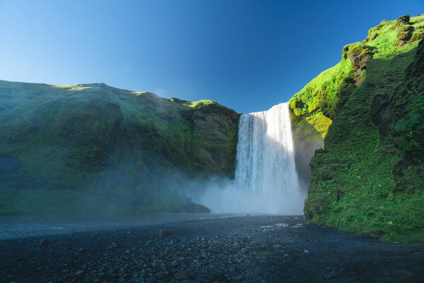 Skogarfoss waterfall and summer sunny day, Iceland - Foto, imagen