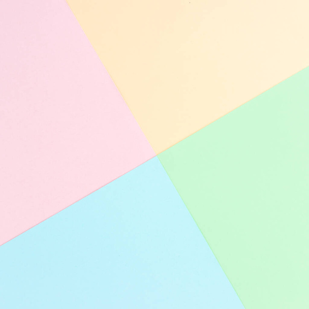 Background pastel colors: pink, yellow, blue, green. Geometric pattern papers. Minimal concept. Flat lay, Top view.  - Valokuva, kuva
