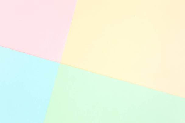 Background pastel colors: pink, yellow, blue, green. Geometric pattern papers. Minimal concept. Flat lay, Top view.  - Photo, image