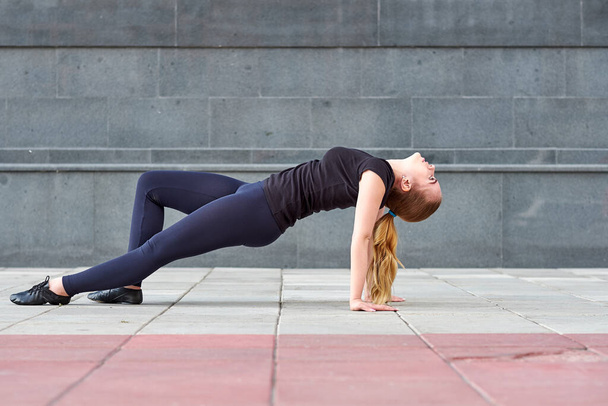 Stretching fit or dancer woman doing exercise - Fotografie, Obrázek