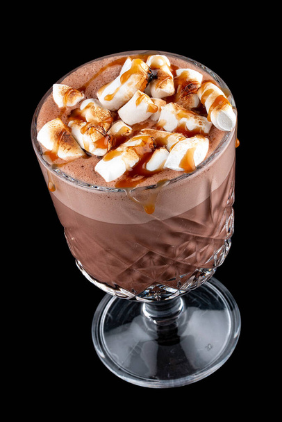 Cocoa with marshmallows and caramel. On dark background - Valokuva, kuva