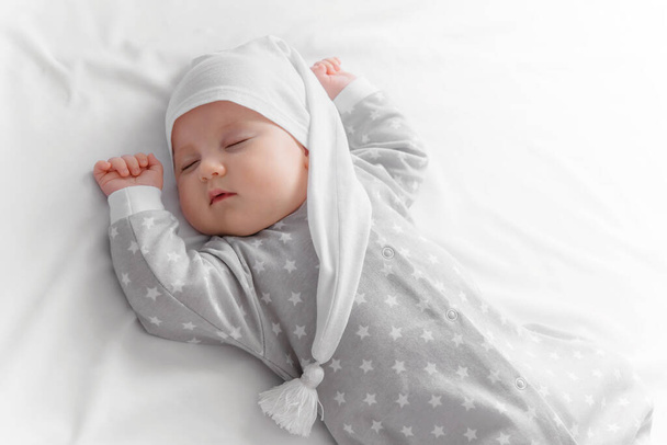 Cute sleeping baby in the bed - Foto, immagini
