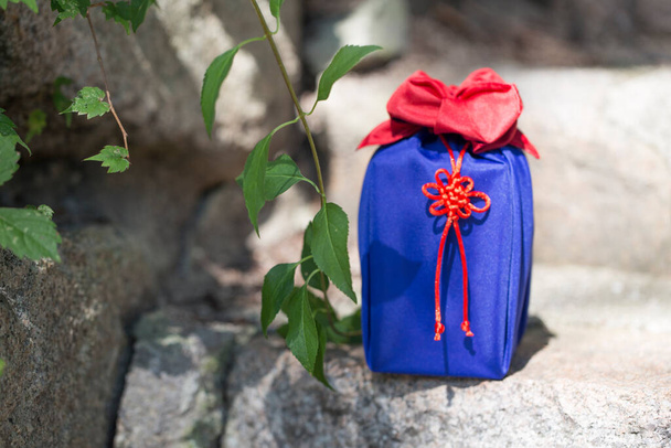 Korean traditional wrapping decorated with silk and an ornament - Photo, Image