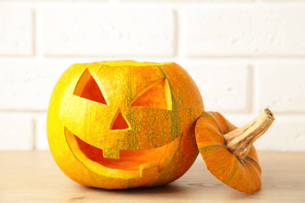 Halloween pumpkin head jack lantern on white background. Top view - Foto, Bild