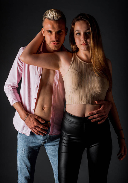 Portrait of a good looking young couple dressed in stylish clothing - Foto, Bild