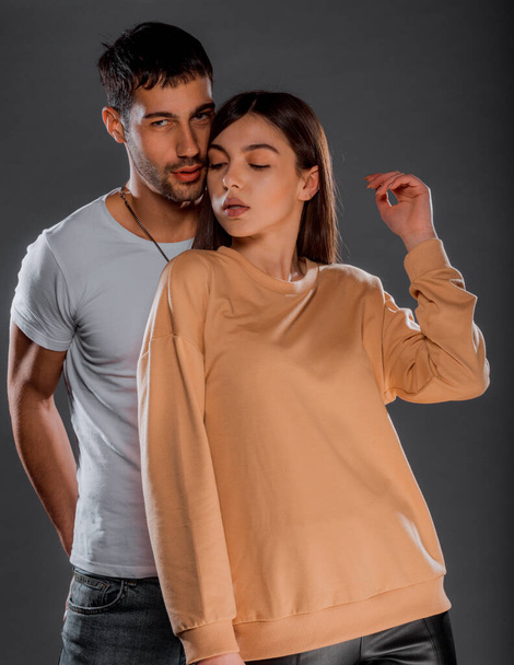 Sensual elegant loving couple wearing modern style clothes - Valokuva, kuva