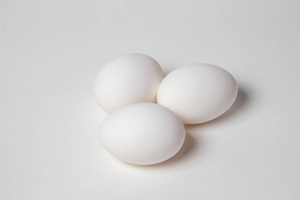 Eggs on a white background. White chicken eggs - 写真・画像