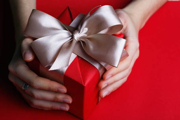girl holding christmas presents in hands -  happy New Yea - 写真・画像