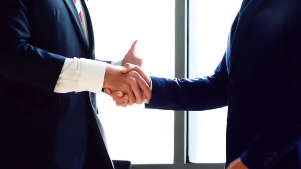 Business people handshake in corporate office - Footage, Video