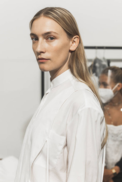MILAN, ITALY - SEPTEMBER 23: Gorgeous model poses in the backstage just before Simona Marziali show during Milan Women's Fashion Week on SEPTEMBER 23, 2020 in Milan - Fotografie, Obrázek