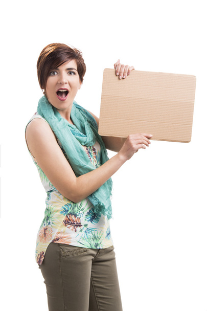 Beautiful woman with a cardboard - Foto, afbeelding