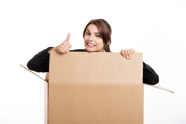 Business woman appear inside a big card box - Фото, зображення