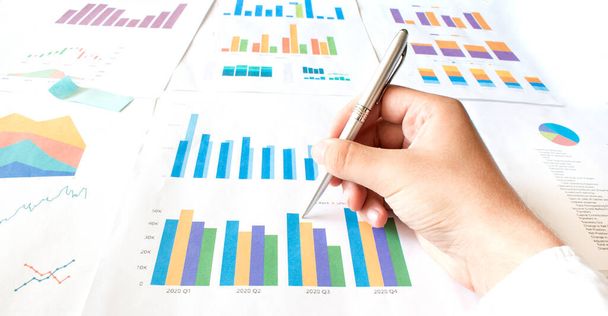 businessman working calculate data document graph chart report marketing research development planning management strategy analysis financial accounting. Business office concept. - Valokuva, kuva