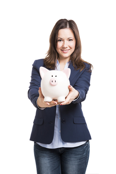 Business woman showing a piggy bank - Φωτογραφία, εικόνα