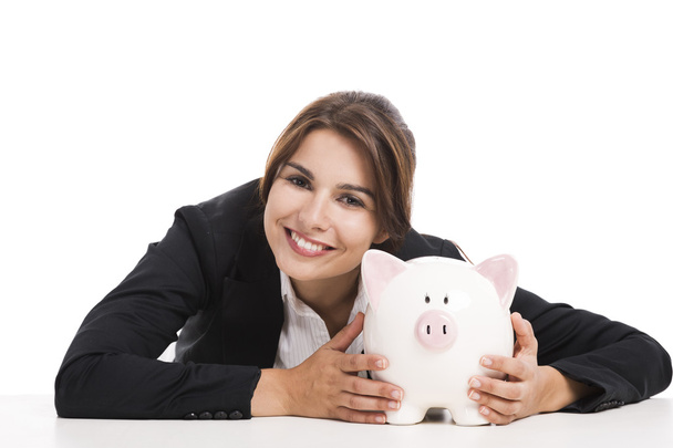 Businesswoman with a piggy bank - Фото, изображение