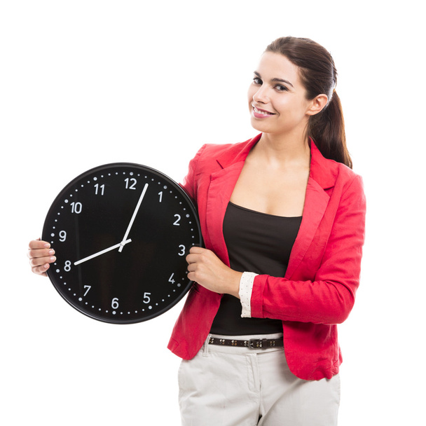 Business woman holding a clock - Foto, Bild