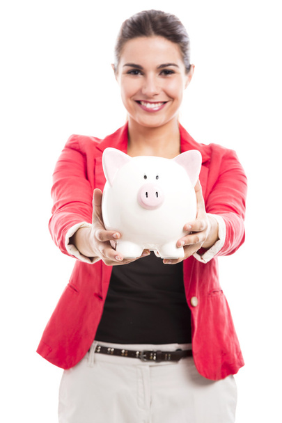 Business woman with a piggy bank - Фото, изображение