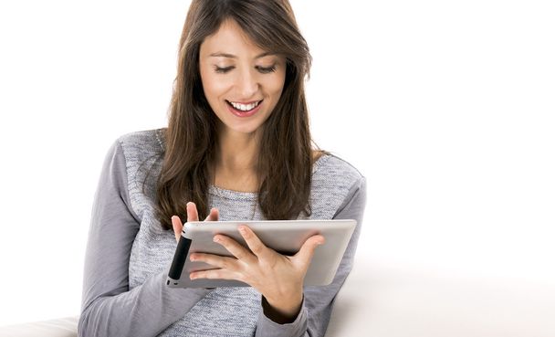 Woman working with a tablet - Foto, Bild