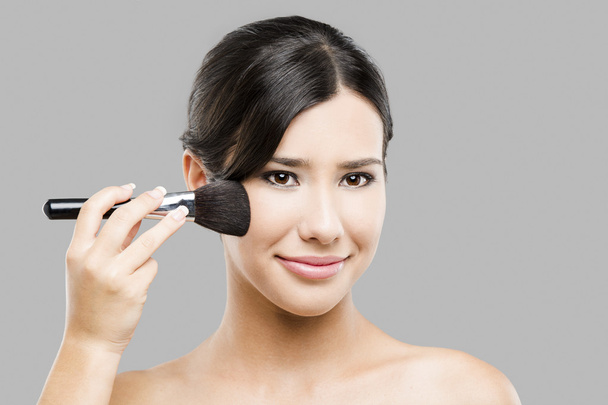 Applying makeup - Foto, imagen