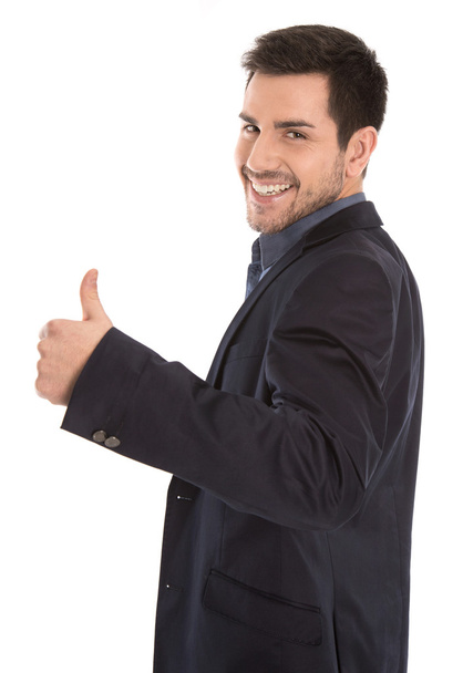 Isolated successful smiling young business man with thumb up. - Foto, Imagem