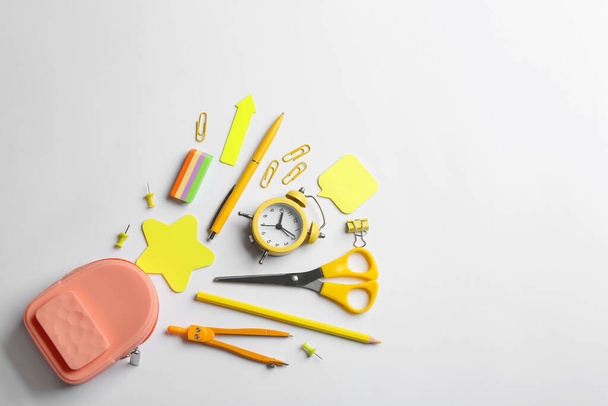 Flat lay composition with school stationery on white background, space for text. Back to school - Φωτογραφία, εικόνα