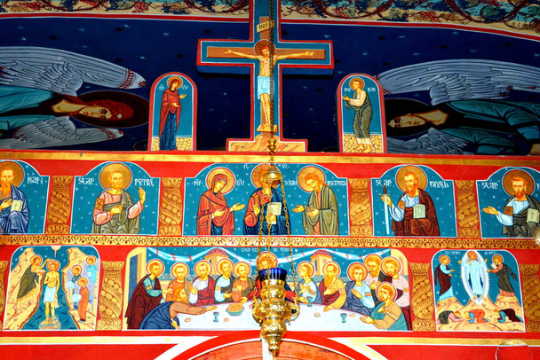 Orthodox Icons in Monastery Pestera in Bucegi Massif, in Carpathian Bend Mountains, TranPennsylvania, Romania.Being of great structural and morphological complastic, the Bucegi Massif is as a natural fortress, support bng cliffs. - Фото, зображення