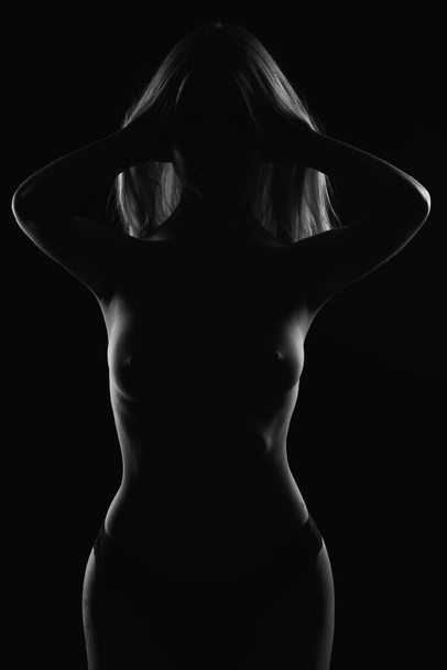 Sexy naked woman. Naked sensual woman with a magnificent figure. - Foto, Imagen