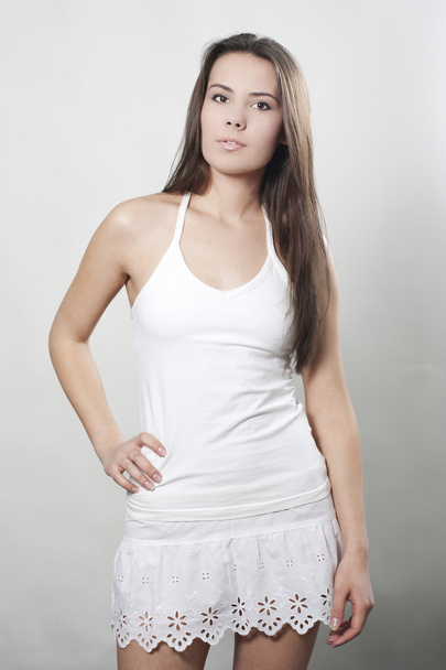 Beautiful woman posing in studio - Fotografie, Obrázek
