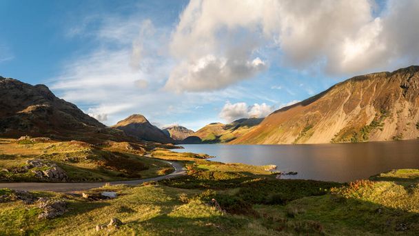 Stunning late Summer landscape image of Wasdale Valley in Lake District, looking towards Scafell Pike, Great Gable and Kirk Fell mountain range - Photo, Image