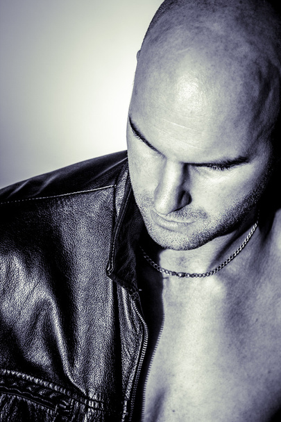 Sexy man wearing leather jacket - Fotó, kép