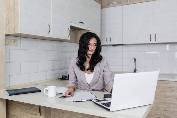 beaytiful businesswoman work at home stay at home vork online - Fotó, kép