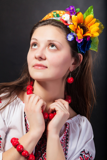 Attractive woman wears Ukrainian national dress - Фото, зображення