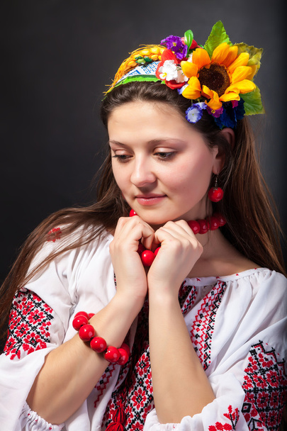 Attractive woman wears Ukrainian national dress - Valokuva, kuva