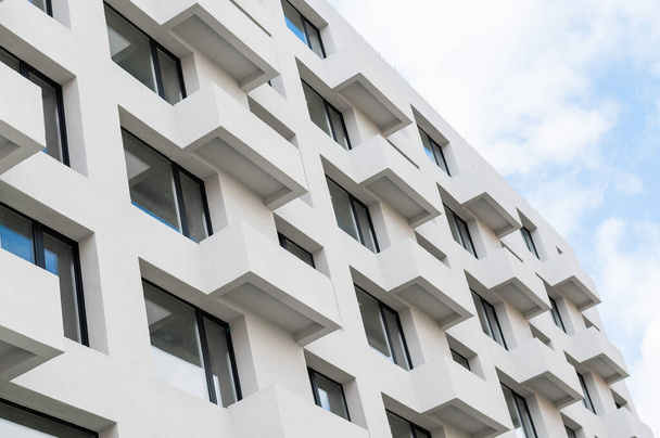 Facade of a modern building with balconies. - Zdjęcie, obraz