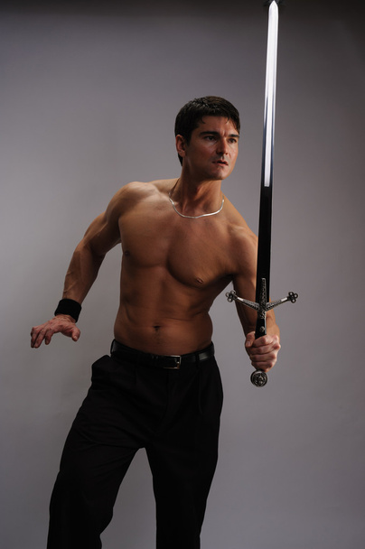Homem com espada
 - Foto, Imagem